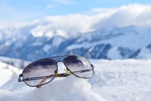 Sunglasses on a snow